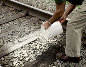 Manual application on Railroad tracks.